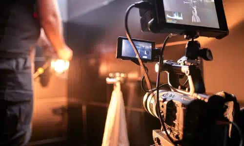 Video production crew filming with professional camera equipment in Ocala, FL